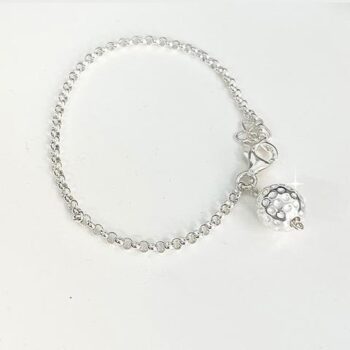 silverarmband med golfboll