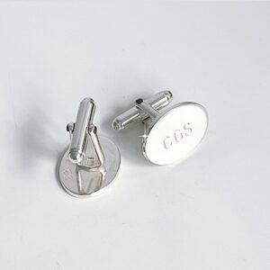 ovala manschettknappar med gravyr